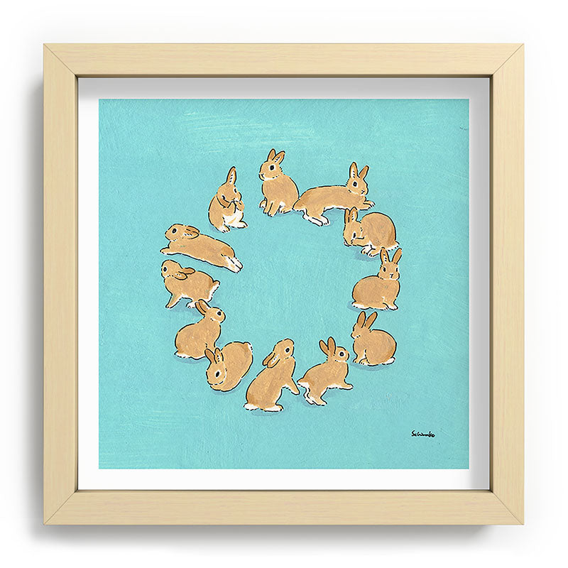 12 rabbits Framed Art Print