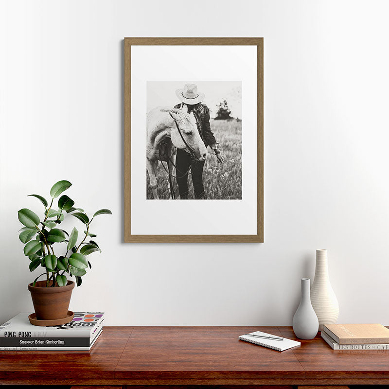 A Cowgirl & Her Horse - Black & White Photo Framed Art Print