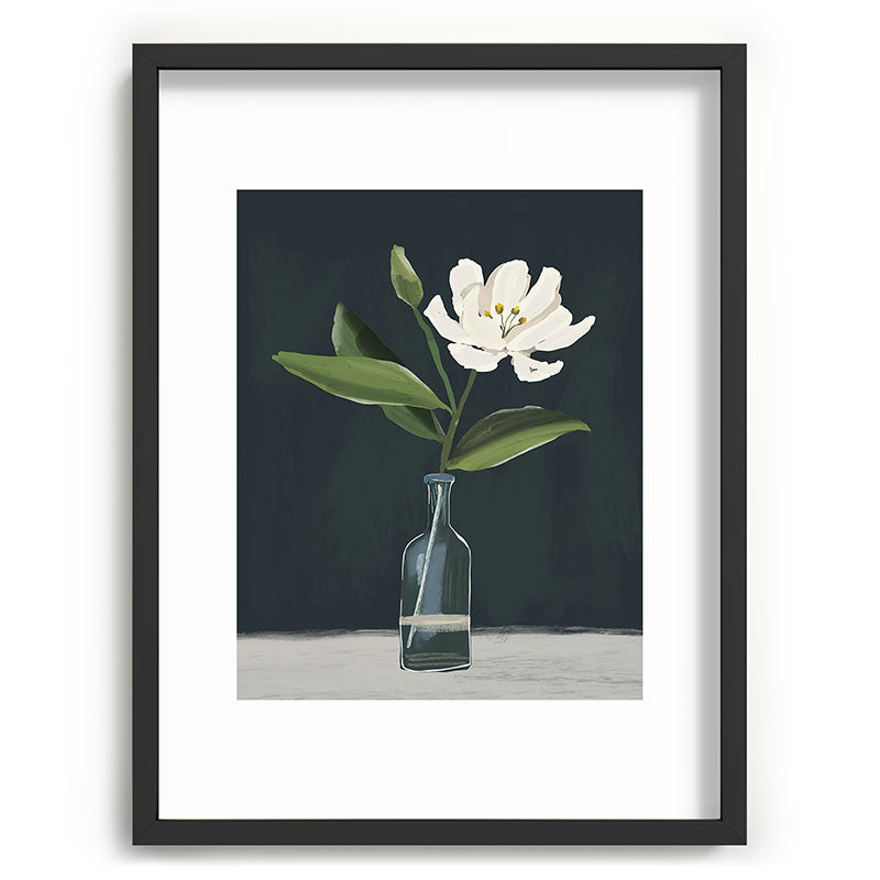 A flower in a vase Framed Art Print