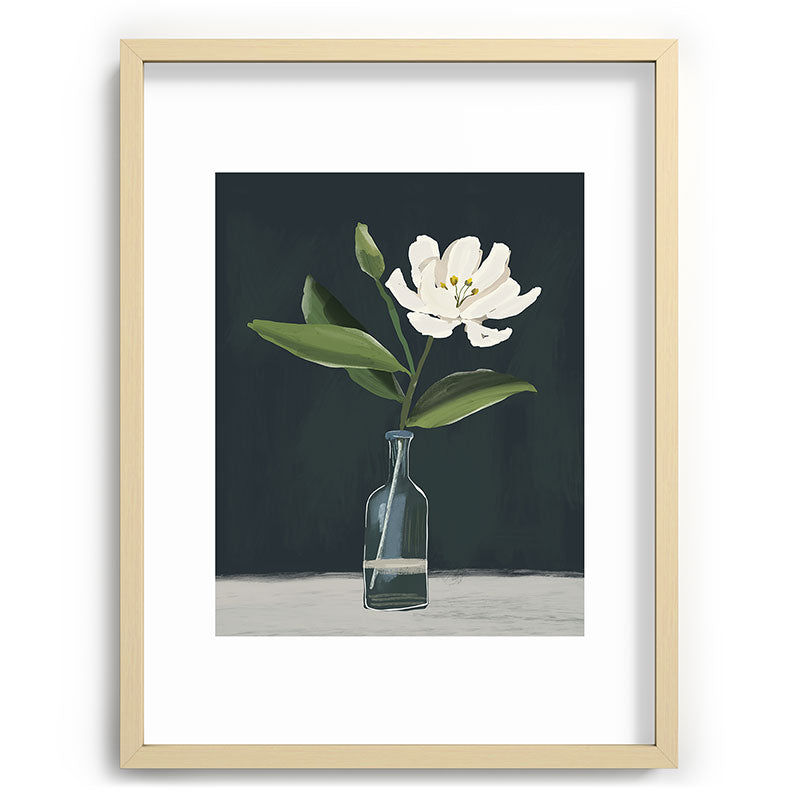 A flower in a vase Framed Art Print