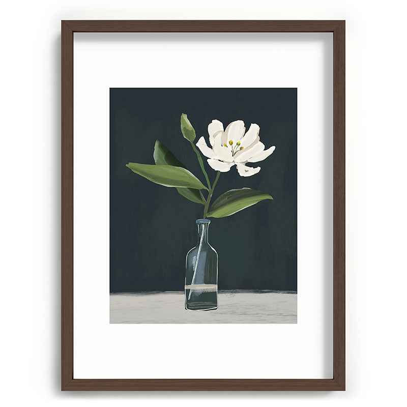 A flower in a vase Framed Art Print