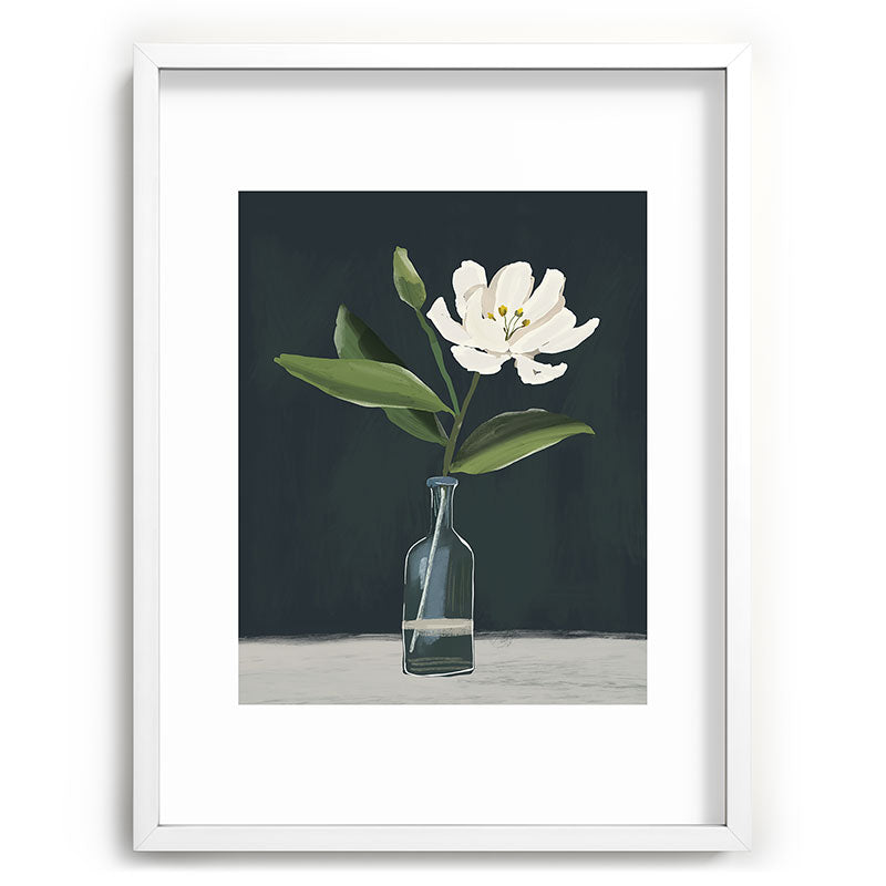 A flower in a vase Framed Art Print