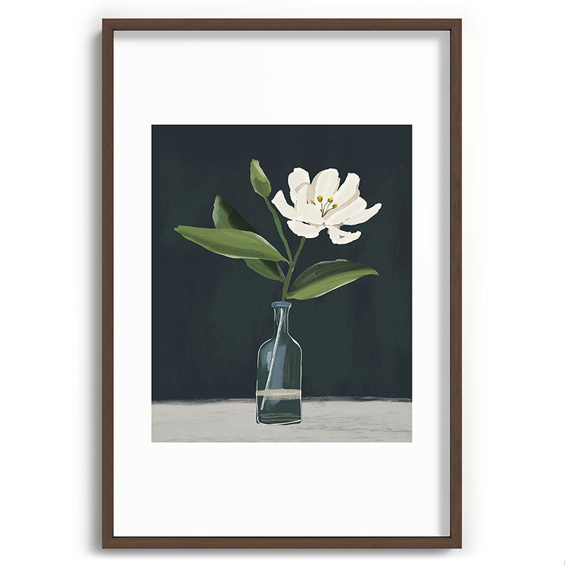 A flower in a vase Framed Art Print