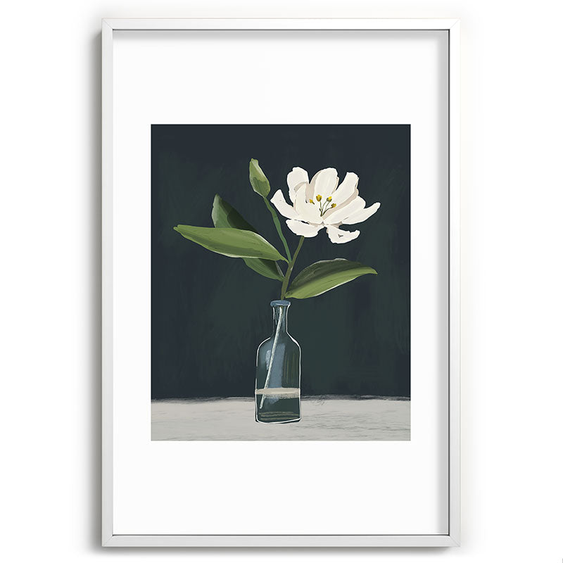A flower in a vase Framed Art Print
