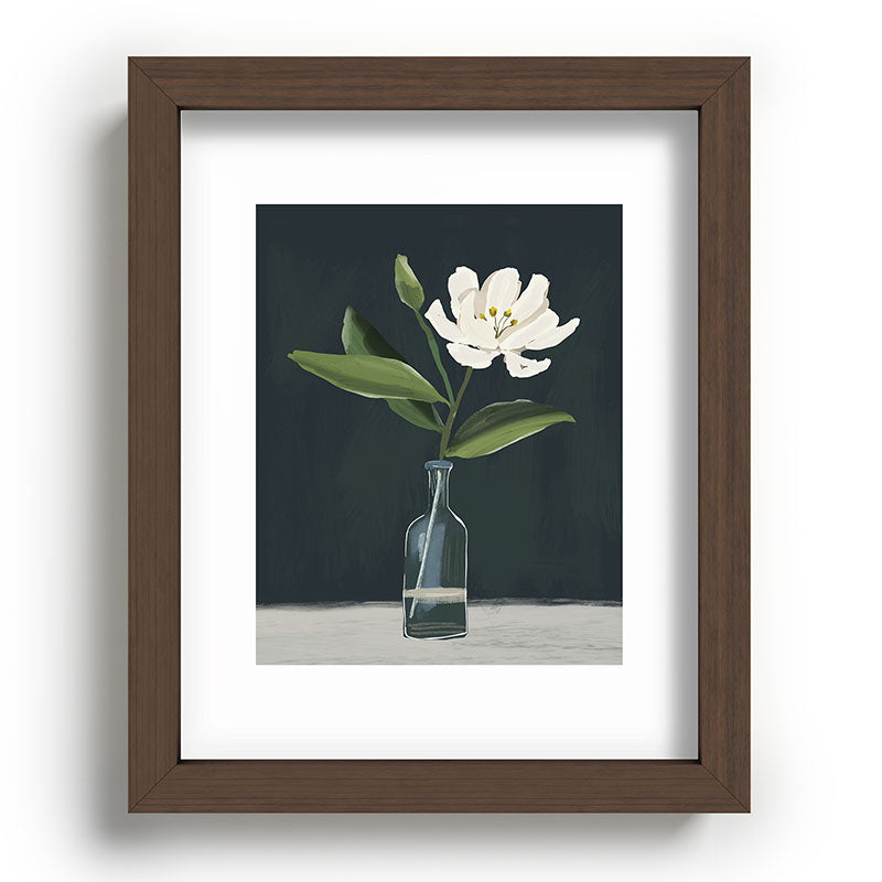 A flower in a vase Framed Art Print