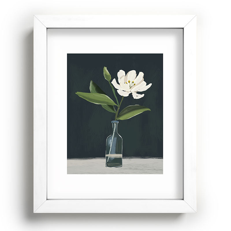 A flower in a vase Framed Art Print