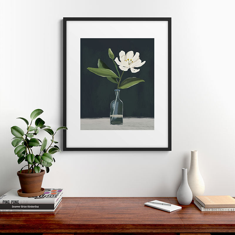 A flower in a vase Framed Art Print