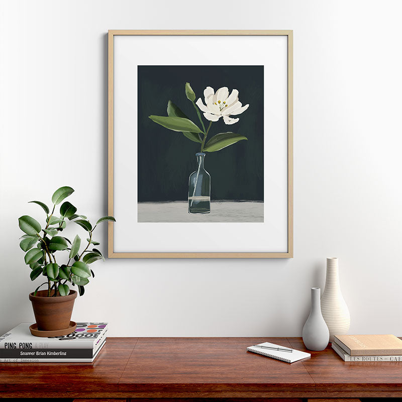 A flower in a vase Framed Art Print