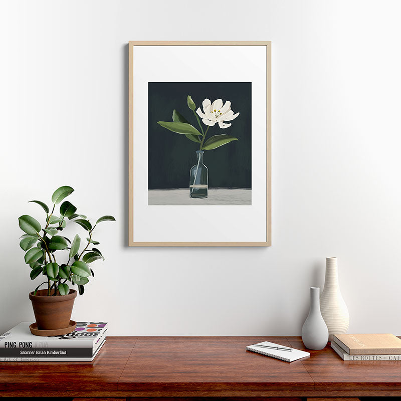 A flower in a vase Framed Art Print