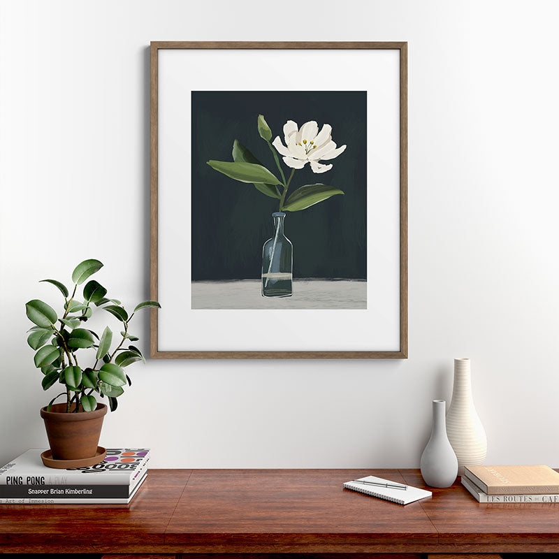 A flower in a vase Framed Art Print