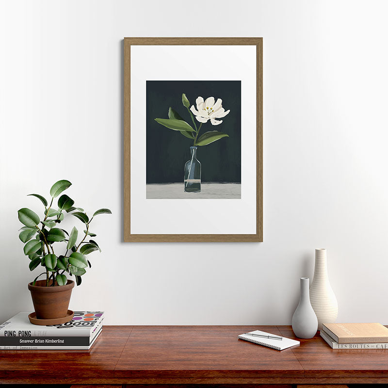 A flower in a vase Framed Art Print