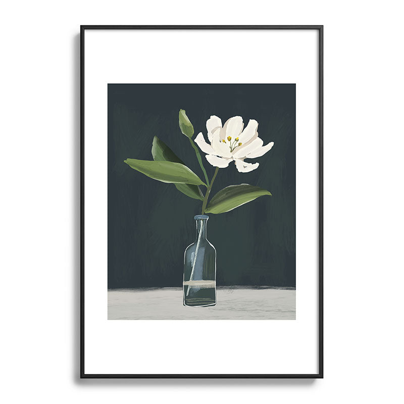 A flower in a vase Framed Art Print