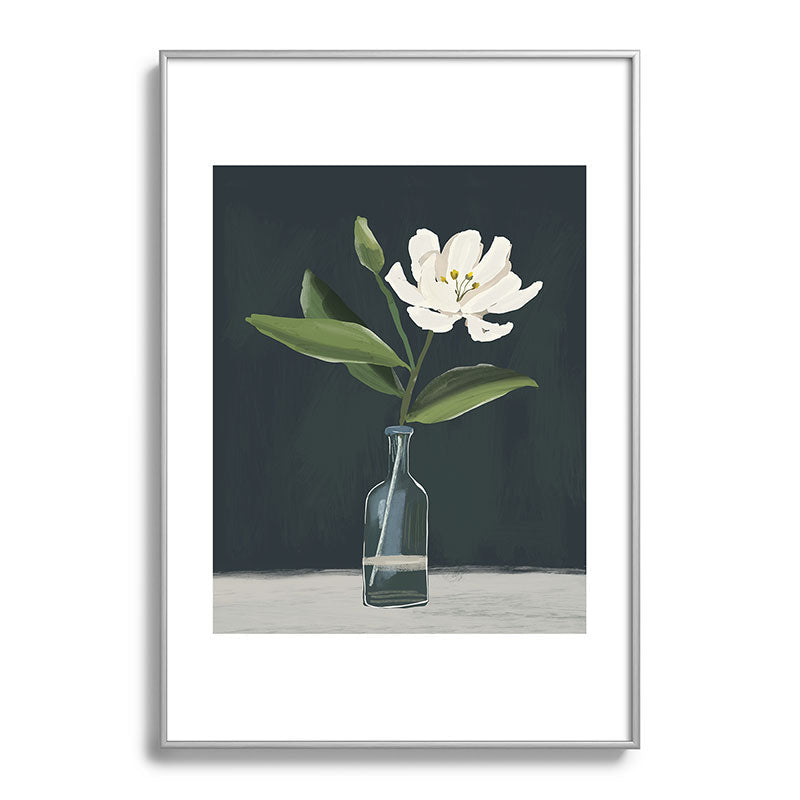 A flower in a vase Framed Art Print