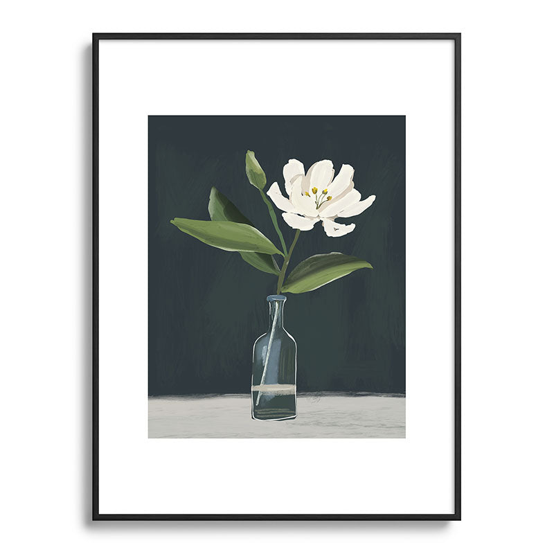 A flower in a vase Framed Art Print