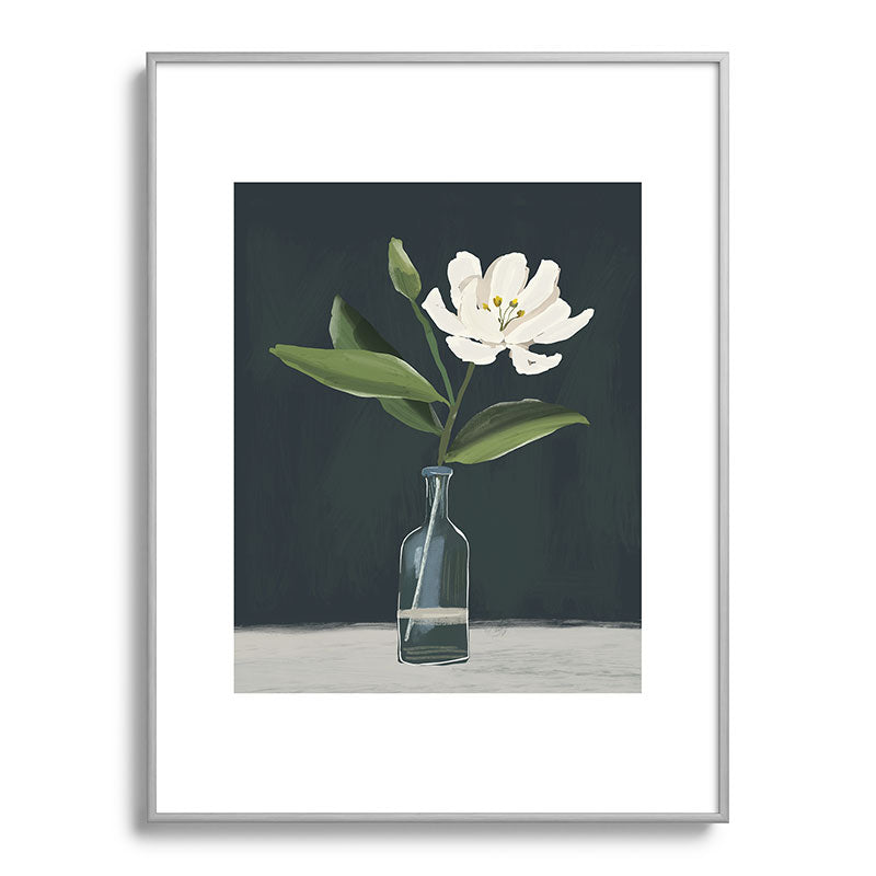 A flower in a vase Framed Art Print