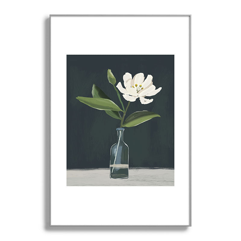 A flower in a vase Framed Art Print