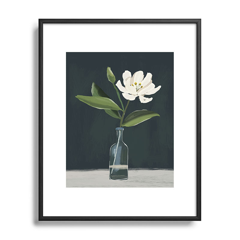 A flower in a vase Framed Art Print
