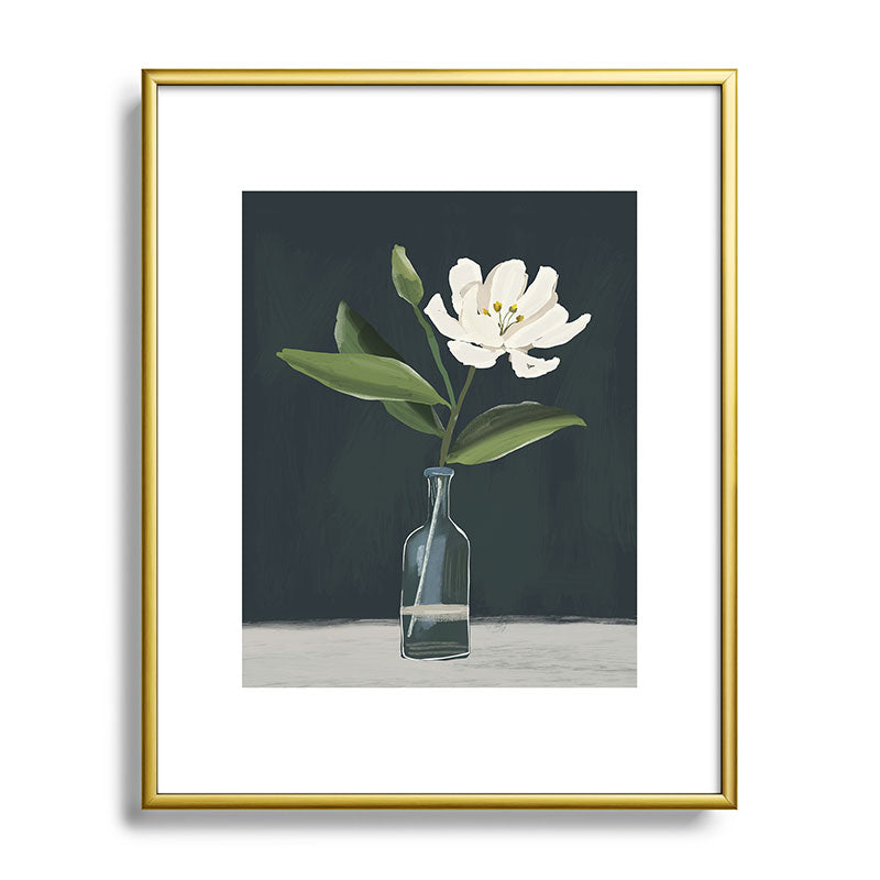 A flower in a vase Framed Art Print