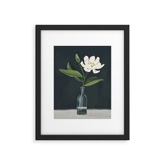 A flower in a vase Framed Art Print