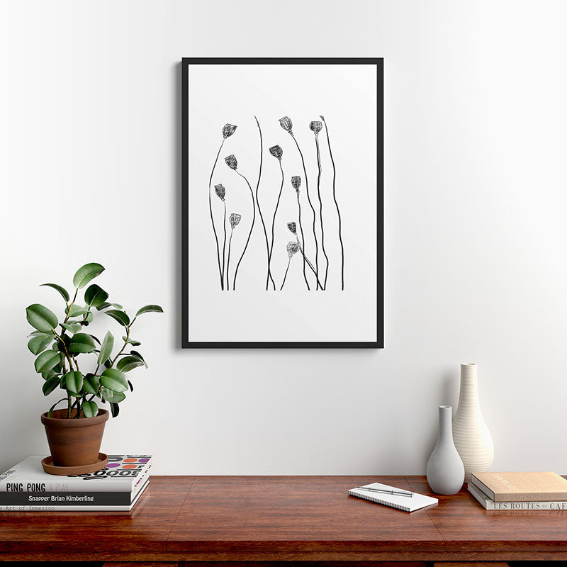A group of poppy heads Framed Art Print