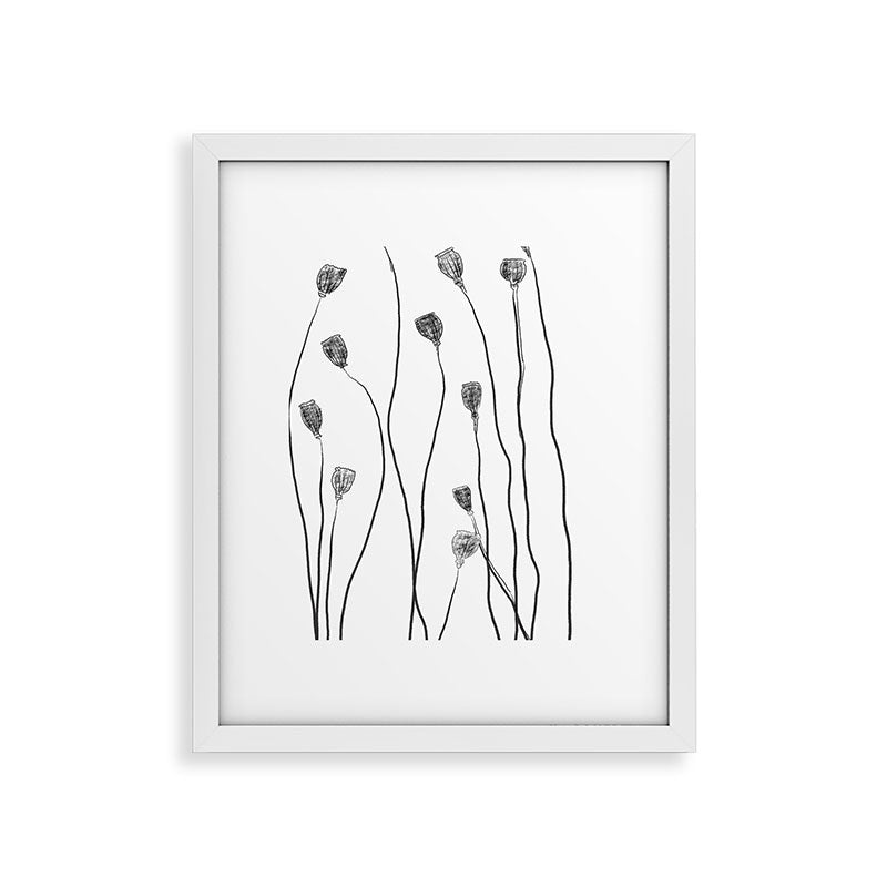 A group of poppy heads Framed Art Print
